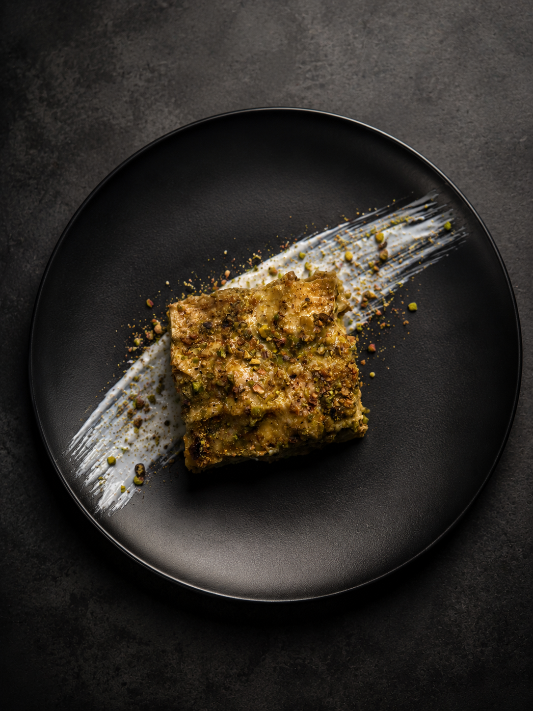 Pistachio lasagna plated for a private dining experience